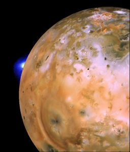 Voyager 1 image of Io showing active plume of Loki on limb. A heart-shaped feature southeast of Loki consists of fallout deposits from active plume Pele. Image credit: NASA/JPL/USGS