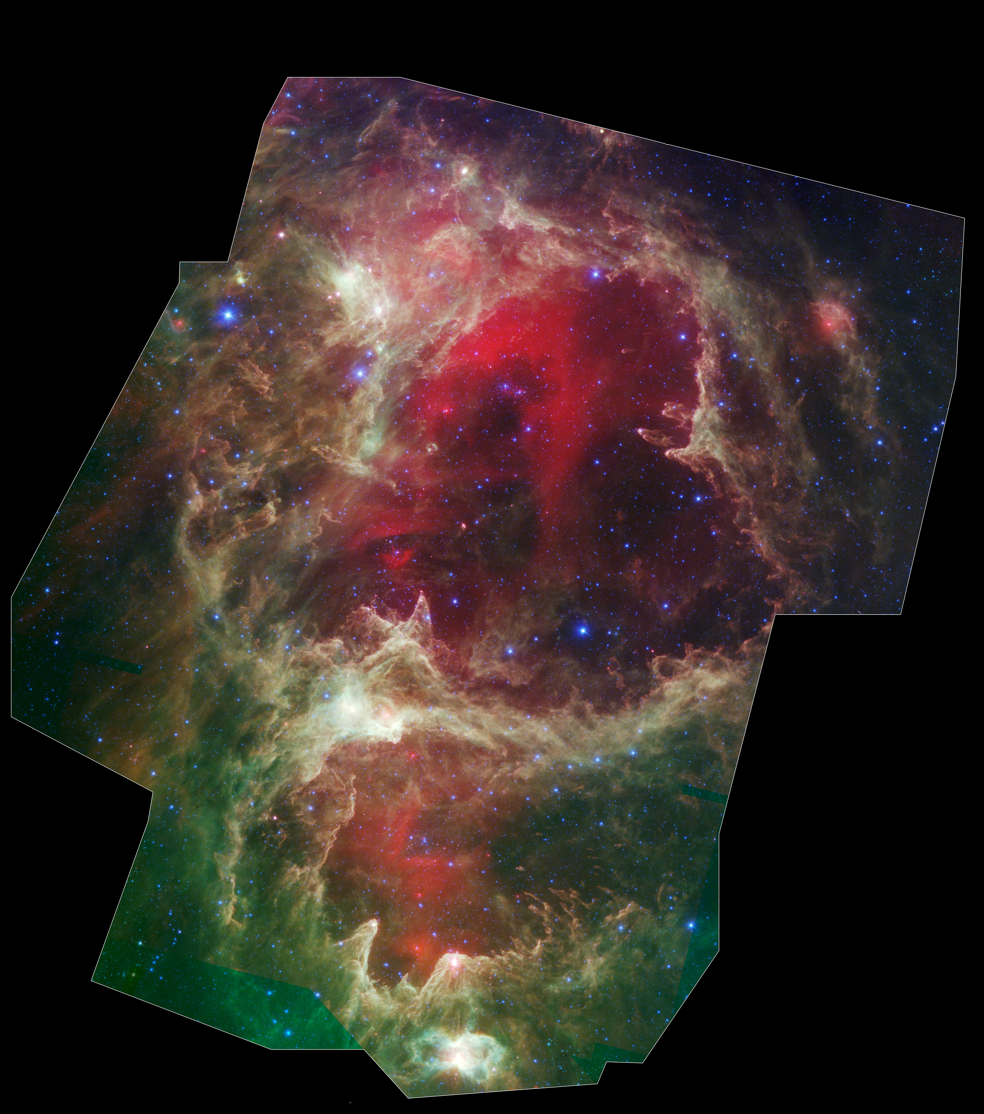 A Stellar Family Tree: Generations of stars can be seen in this view of a vast star-forming region dubbed W5. Massive stars at the hearts of the cavities are thought to have blown away surrounding material, triggering the birth of new stars. Credit: NASA/JPL-Caltech/Harvard-Smithsonian CfA