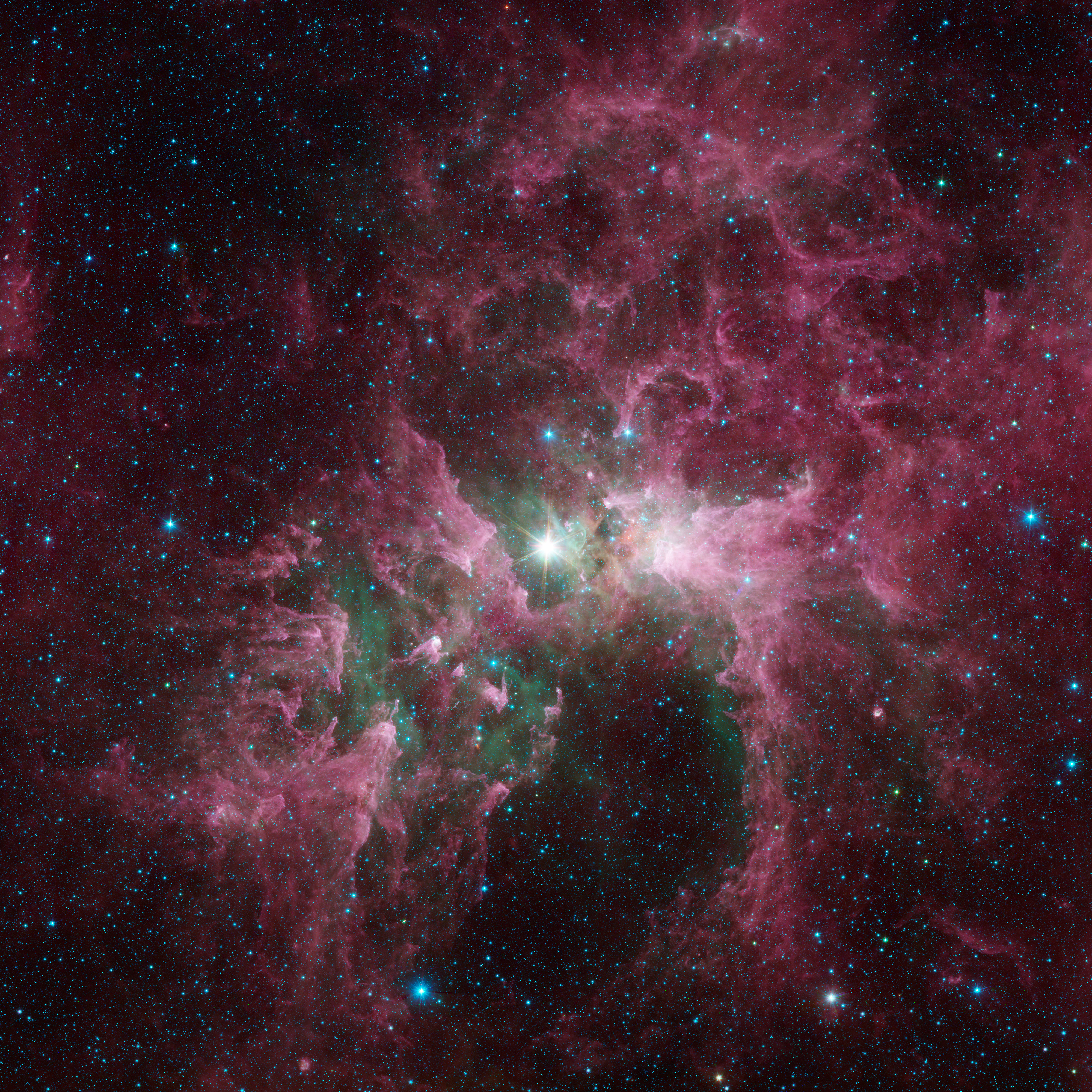 Tortured Clouds of Eta Carinae: Massive stars can wreak havoc on their surroundings, as can be seen in this new view of the Carina Nebula from the Spitzer Space Telescope. Credit: NASA/JPL-Caltech