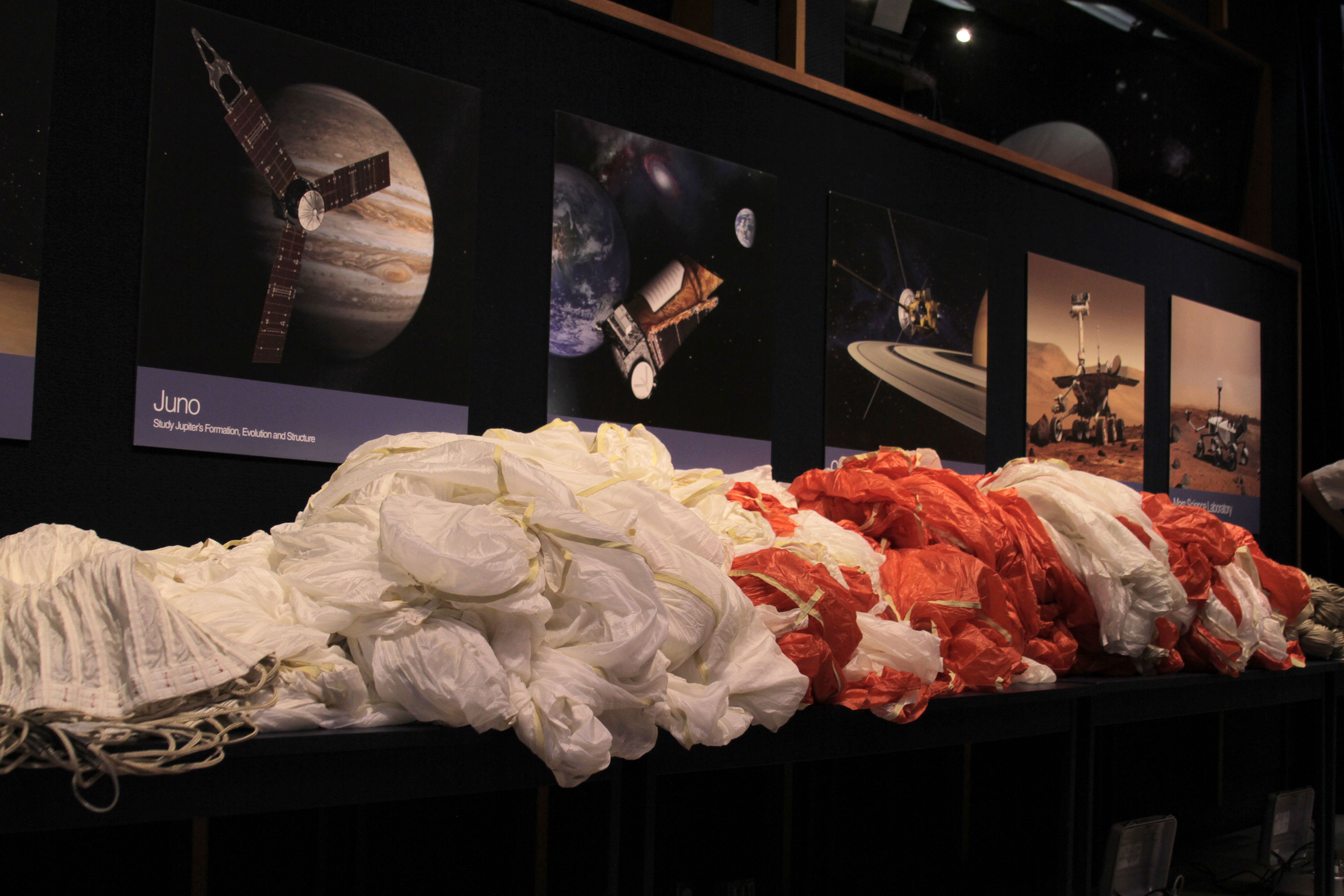 With larger robotic probes and even humans one day being sent to the surface of Mars, NASA is hard at work on the Low-Density Supersonic Decelerator Project to develop new ways to safely land on the Red Planet. A 110-foot diameter parachute is being test at JPL. Credit: Brenden Clark