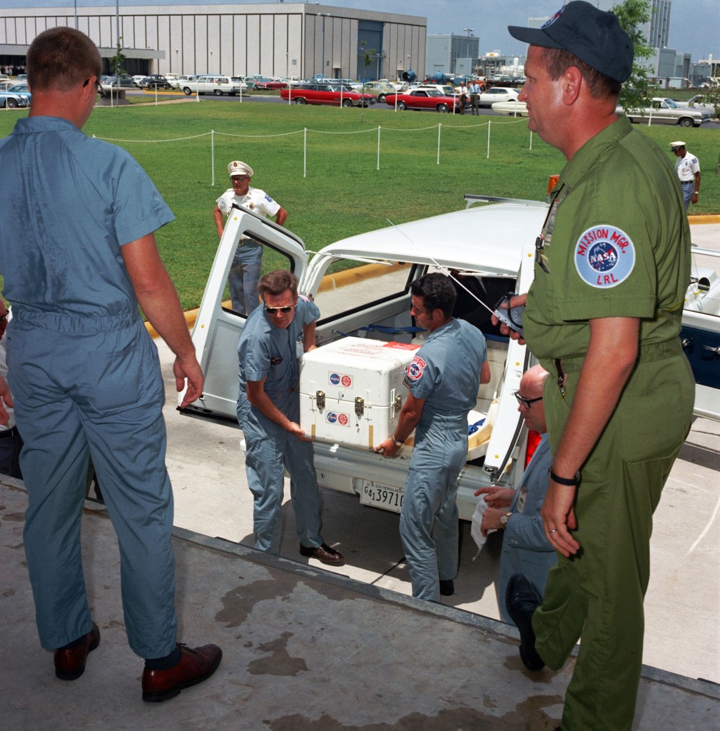 The first Apollo 11 sample return containers are unloaded at the Lunar Receiving Laboratory of the Manned Spacecraft Center in Houston.