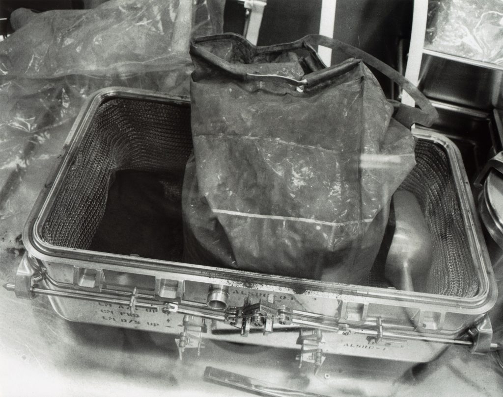 Lunar rock samples being unpacked at MSC on July 25, 1969.