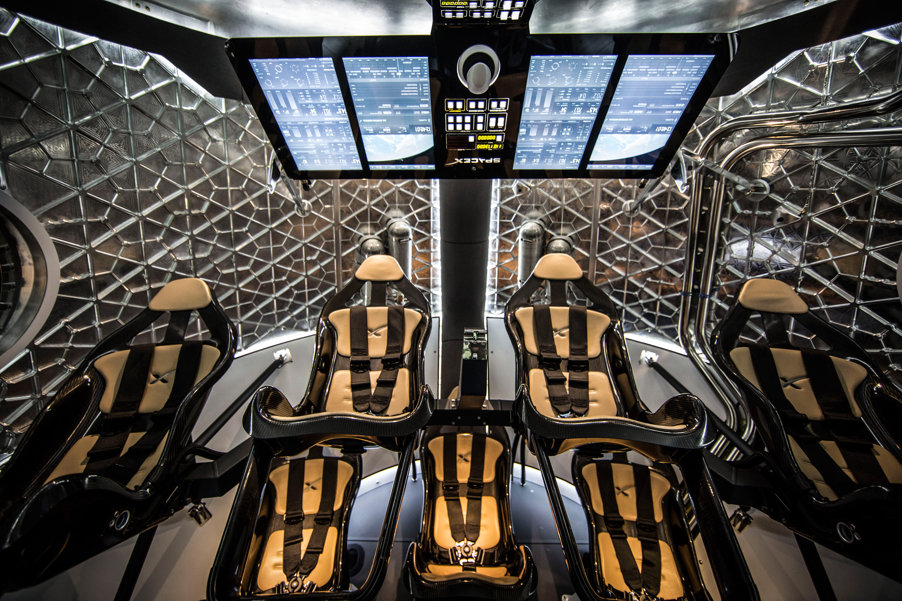 Featuring seating for seven astronauts, the Dragon V2 will be capable of delivering new crews to the International Space Station and eventually Mars. Credit: SpaceX