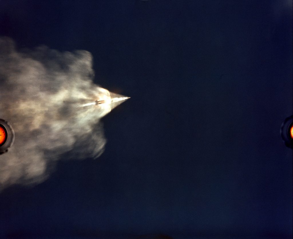The 70mm ALOTS tracking camera mounted on an Air Force EC-135N aircraft flying at about 40,000 feet altitude photographed this event in the early moments of the Apollo 11 launch.