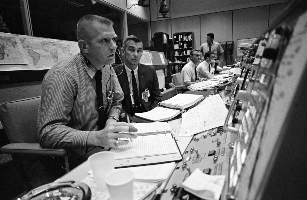 Flight Director Gene Kranz (left) is joined in Mission Control by astronaut Eugene Cernan during the Apollo 11 mission.