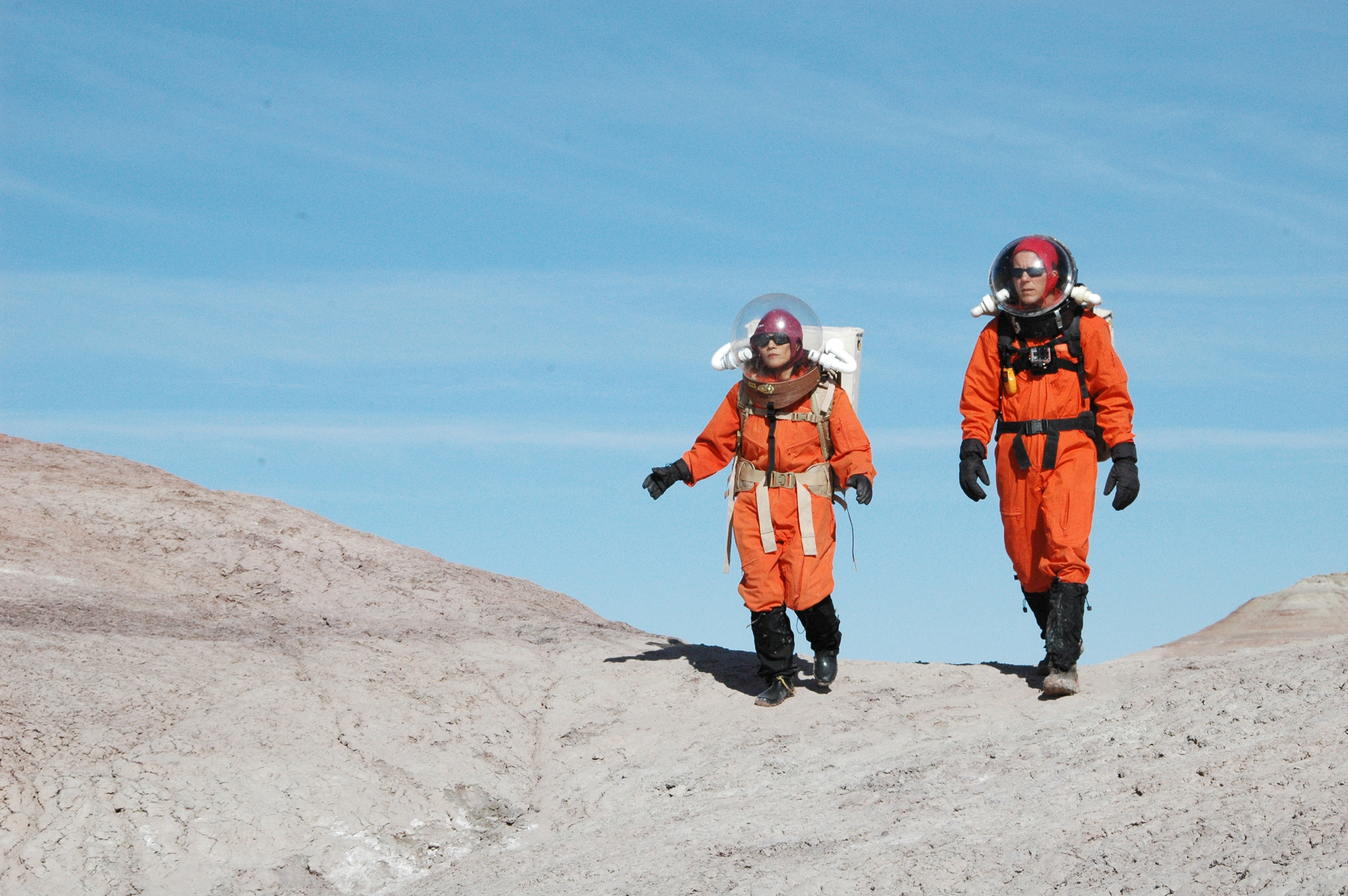 Mars Desert Research Station- exterior desert- astronauts, Kai Staats and Susan Jewell walk back to the MDRS 'Hab.' Credit: Rachael Joy/Science Channel