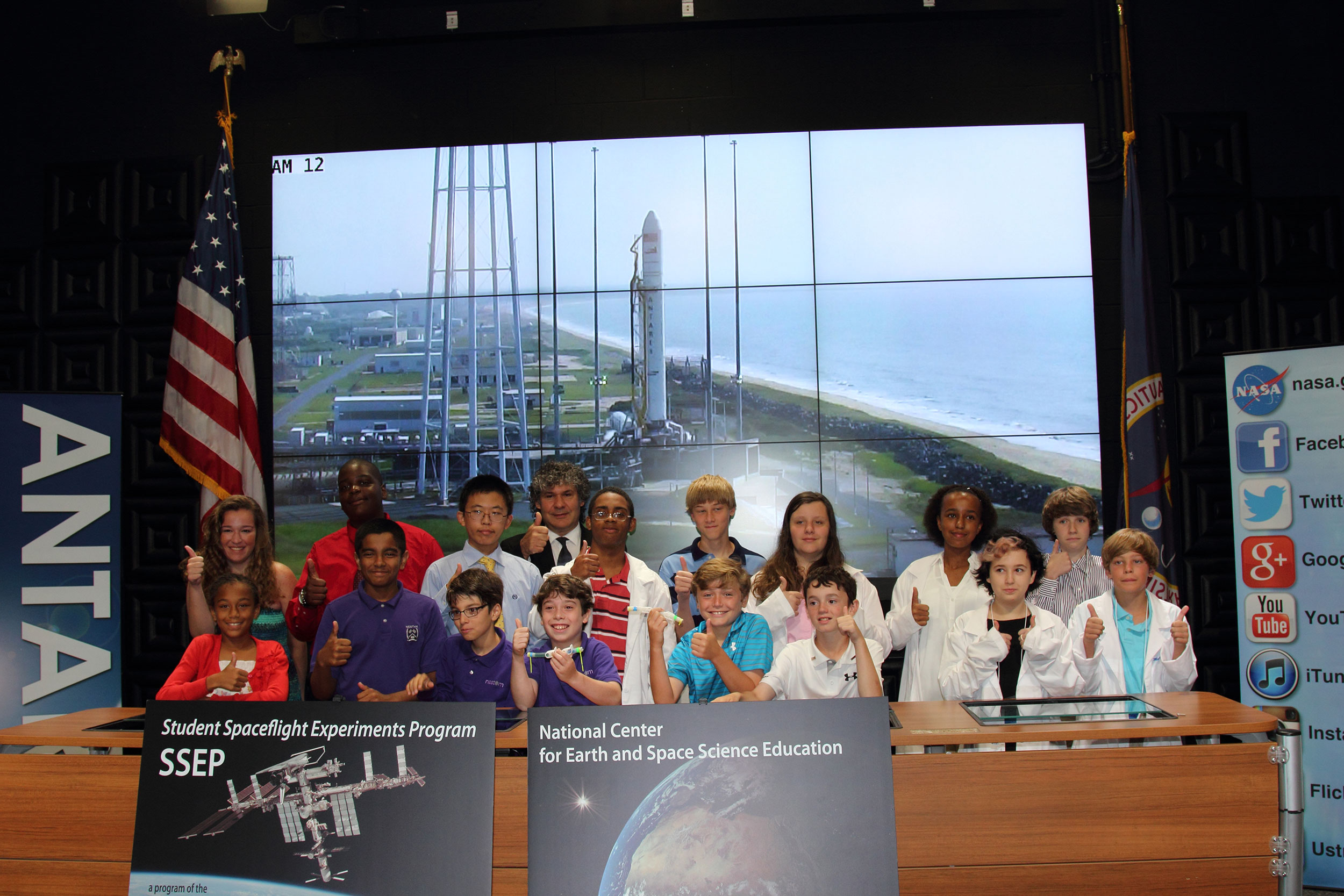 Students from some of the participating SSEP schools stand with program founder, Dr. Jeff Goldstein, the morning of the Antares Orb-2 launch. The students watched their experiments soar into space that same day with much anticipation. Credit: Lloyd Campbell