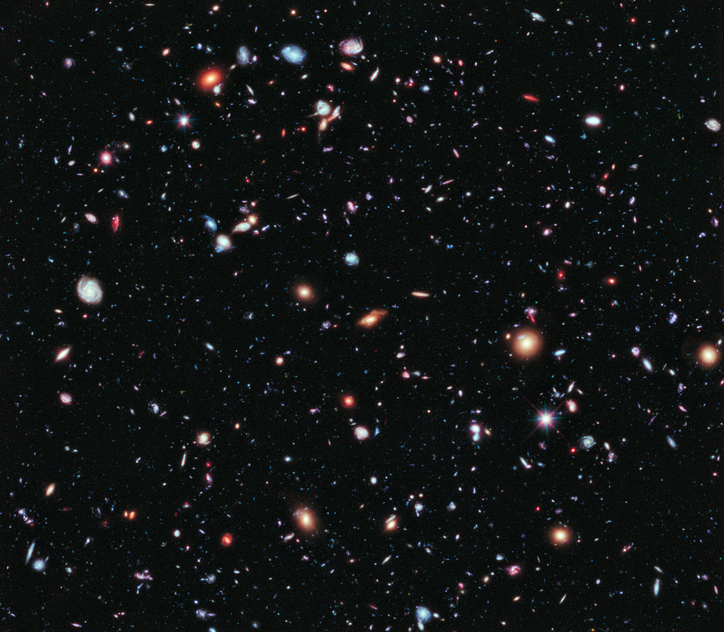 HUBBLE'S TOP 100 • #72 • Credit: NASA, ESA, G. Illingworth, D. Magee, and P. Oesch (University of California, Santa Cruz), R. Bouwens (Leiden University), and the HUDF09 Team