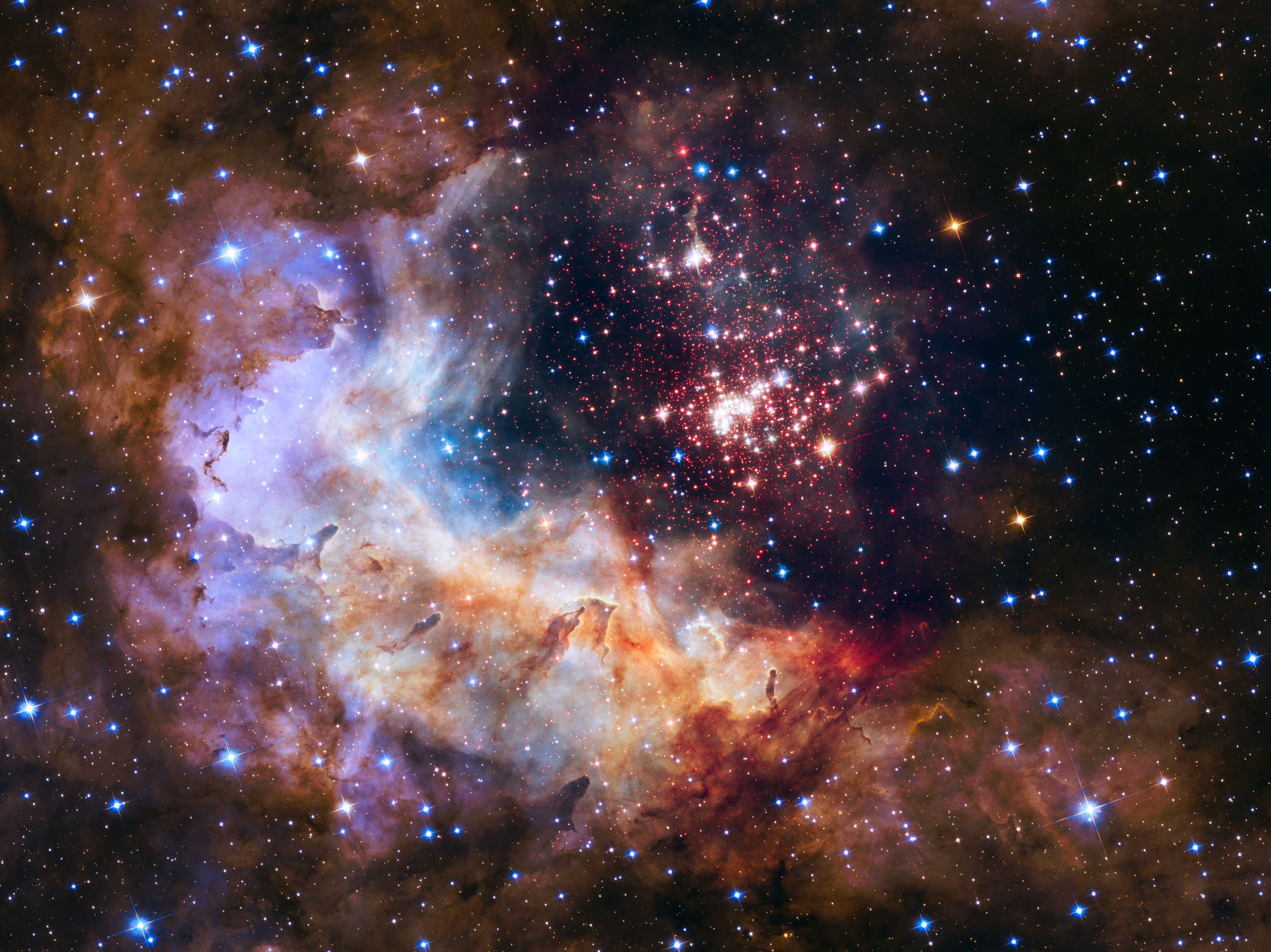 HUBBLE'S OFFICIAL 25th ANNIVERSARY IMAGE • Credit: NASA, ESA, the Hubble Heritage Team (STScI/AURA), A. Nota (ESA/STScI), and the Westerlund 2 Science Team.
