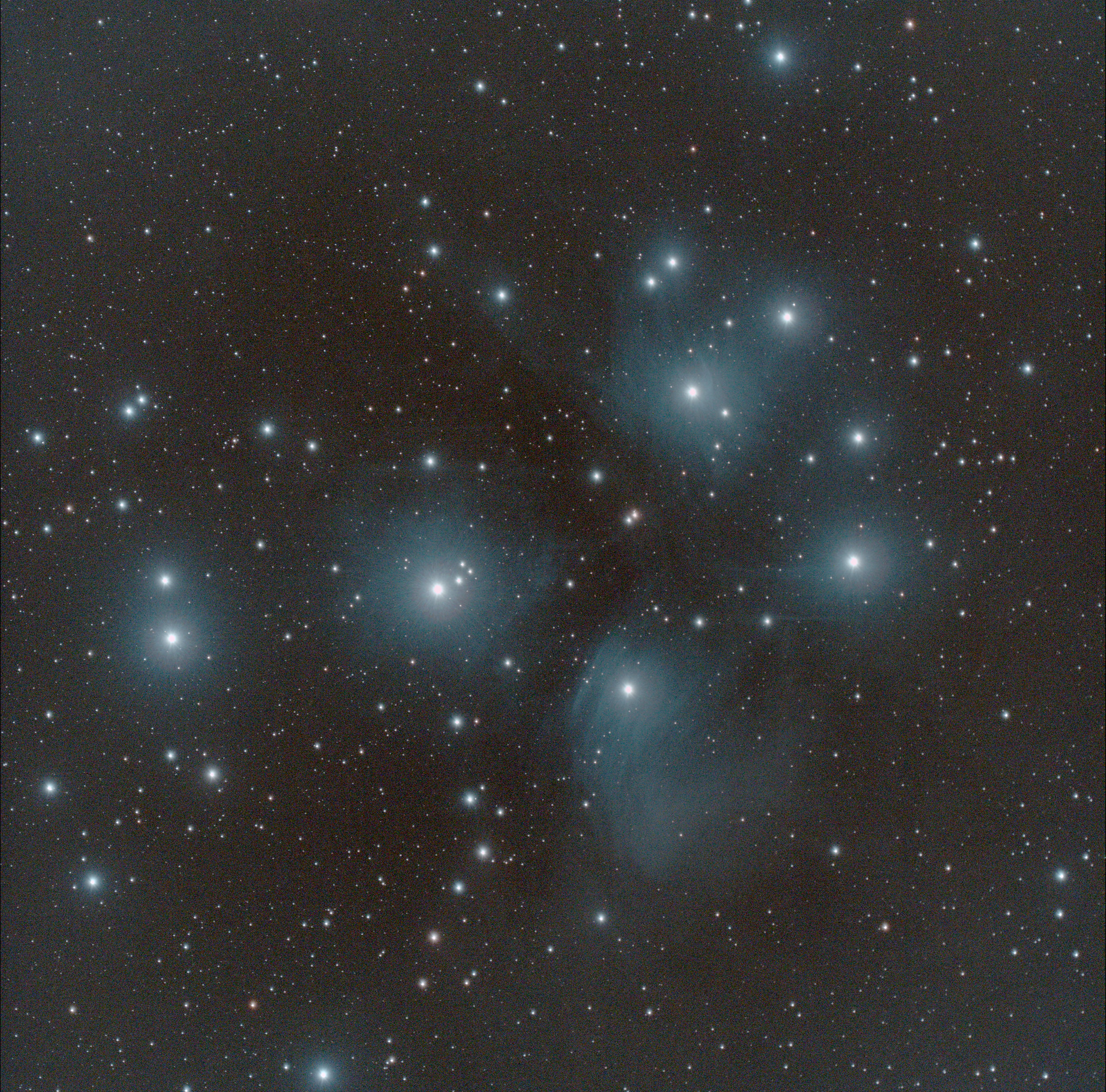 M45 the Pleiades, an Open Cluster visible to the naked eye. Credit: Mike Barrett