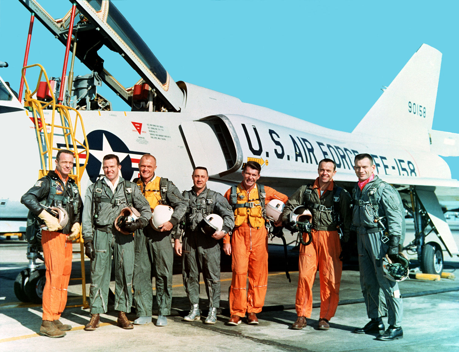 The Original Mercury Seven astronauts with a U.S. Air Force F-106B jet aircraft. From left to right: Scott Carpenter, Gordon Cooper, John Glenn, Gus Grissom, Wally Schirra, Alan Shepard, Deke Slayton. Credit: NASA