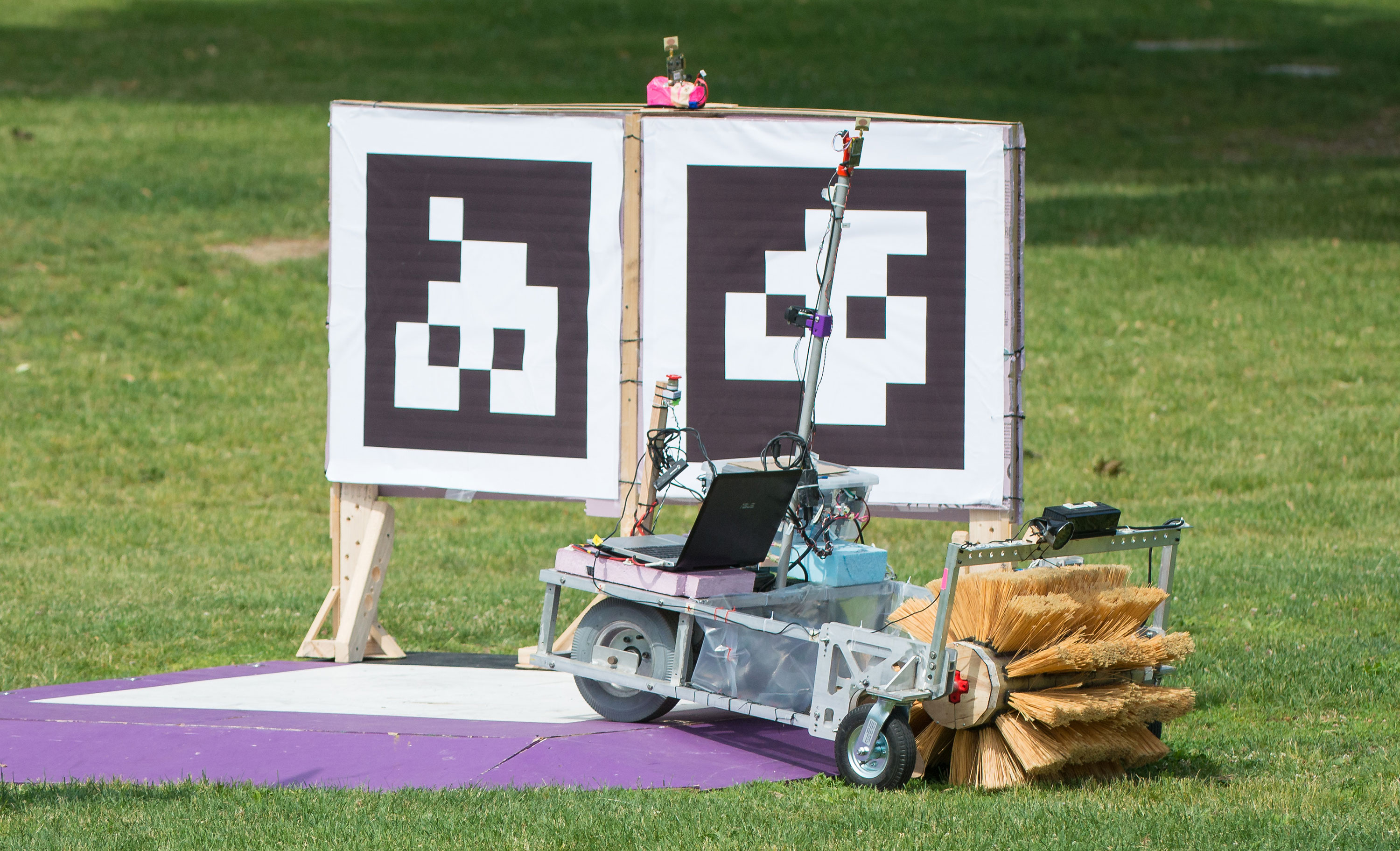 The Mind and Iron team robot is seen as it drives off the starting platform during a rerun of the level one challenge at the 2015 Sample Return Robot Challenge. Credit: NASA/Joel Kowsky