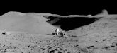 Apollo 15 astronaut Dave Scott and the Lunar Rover with a view up Hadley Rille in the background. Credit: NASA via Retro Space Images