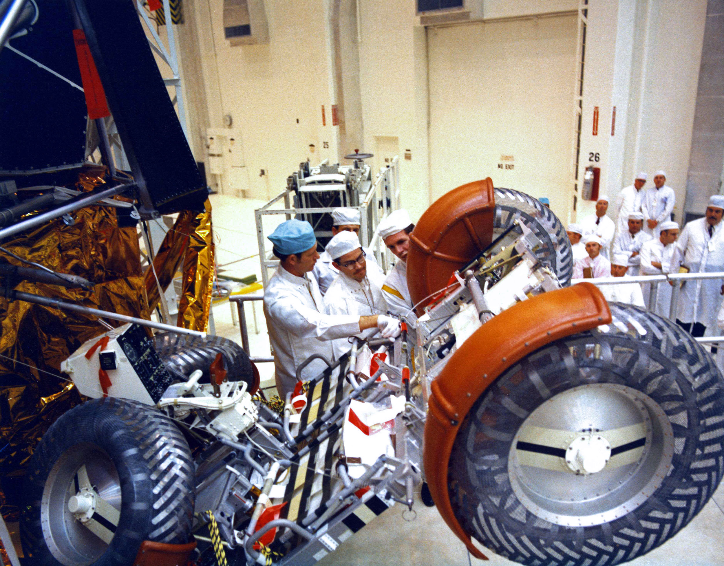 Lunar Rover No.1, is stowed inside the Apollo 15 Lunar Module at the Manned Spacecraft Operations Building at Kennedy Space Center, Florida. When completely stowed, all four wheels of the LRV are folded against the chassis. Credit: NASA via Retro Space Images