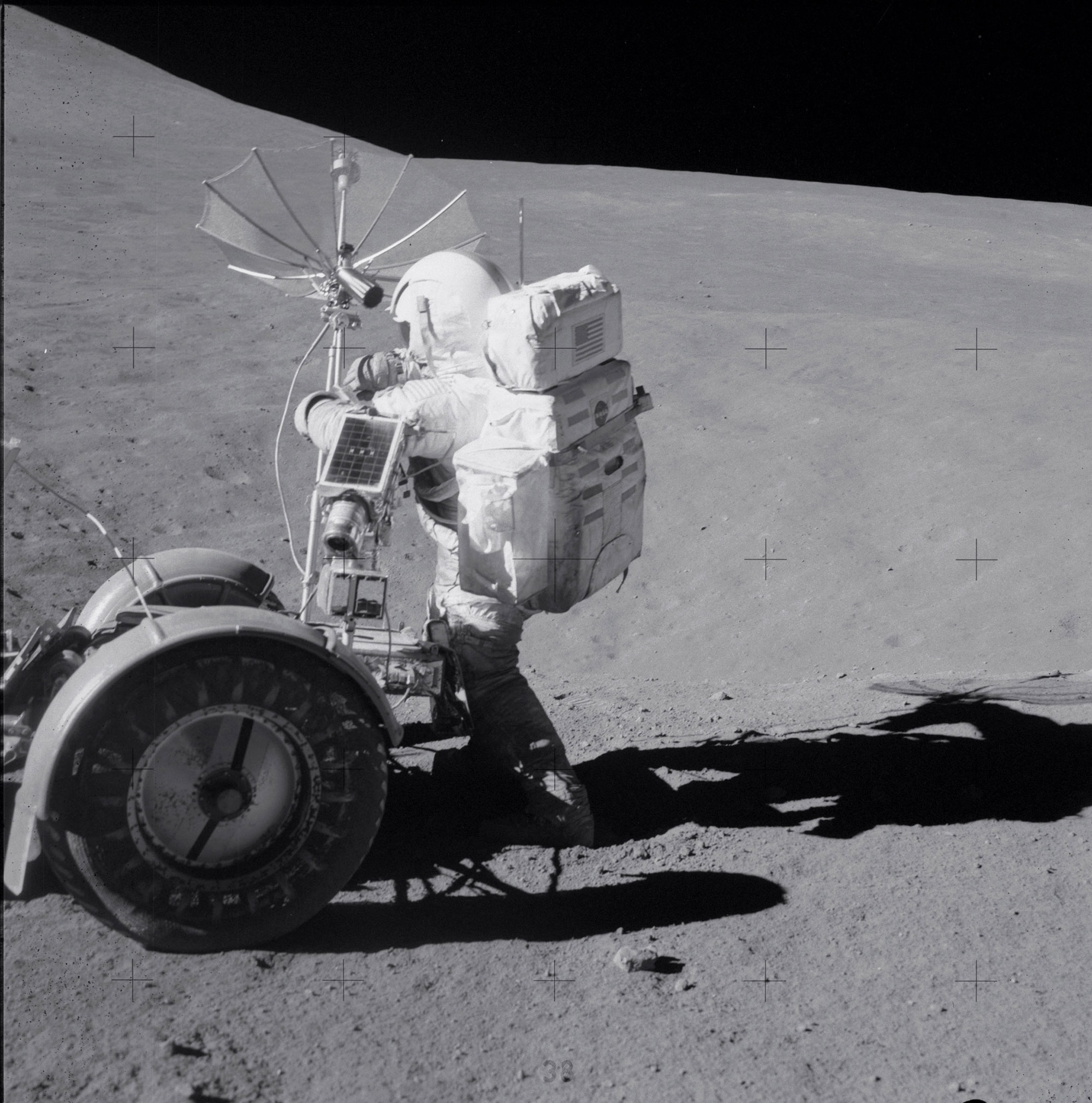 Working at Spur Crater during the second EVA. Credit: NASA via Retro Space Images