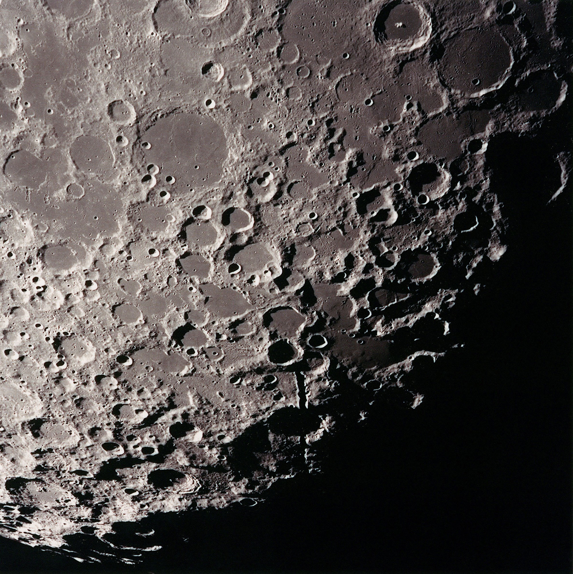 View from lunar orbit looking towards the Moon’s South pole. Credit: NASA via Retro Space Images