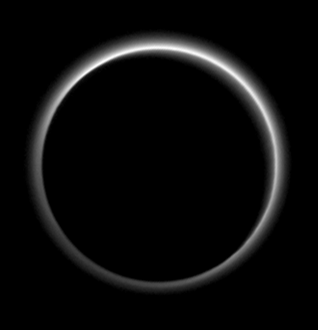 Pluto sends a breathtaking farewell to New Horizons. Backlit by the sun, Pluto’s atmosphere rings its silhouette like a luminous halo in this image taken by NASA’s New Horizons spacecraft around midnight EDT on July 15. This global portrait of the atmosphere was captured when the spacecraft was about 1.25 million miles (2 million kilometers) from Pluto and shows structures as small as 12 miles across. The image, delivered to Earth on July 23, is displayed with north at the top of the frame. Credit: NASA/JHUAPL/SwRI