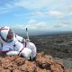 Ross Lockwood lounges on a rock outcrop outside the Hi-SEAS habitat. Credit: Ross Lockwood