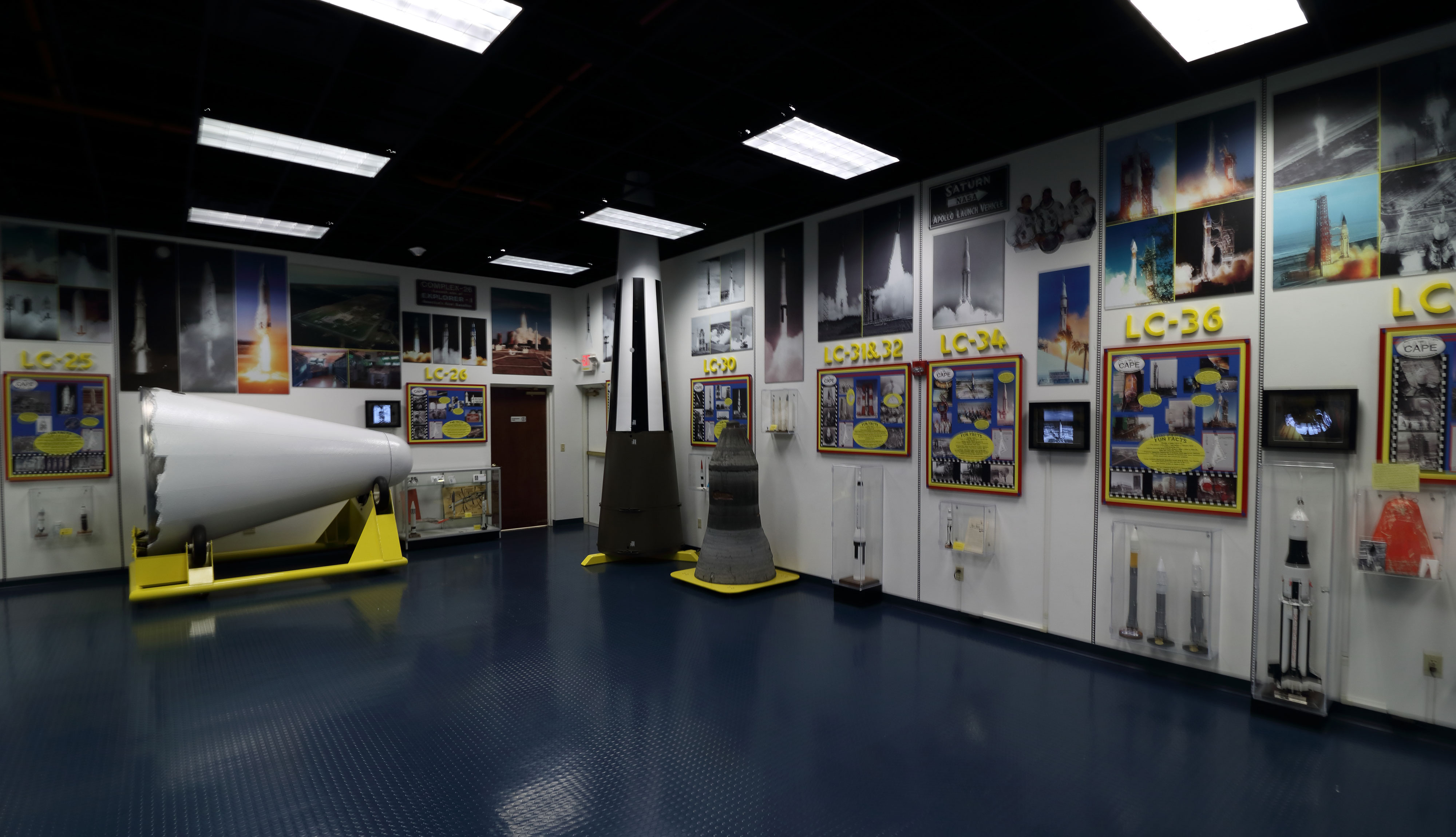 Among the artifacts on display at the Air Force Space and Missile History Center are an original Gemini console (top left), an Atlas sustainer rocket engine (top roght), and a Jupiter rocket nose cone (white cone in bottom photo). Credit: Lloyd Campbell