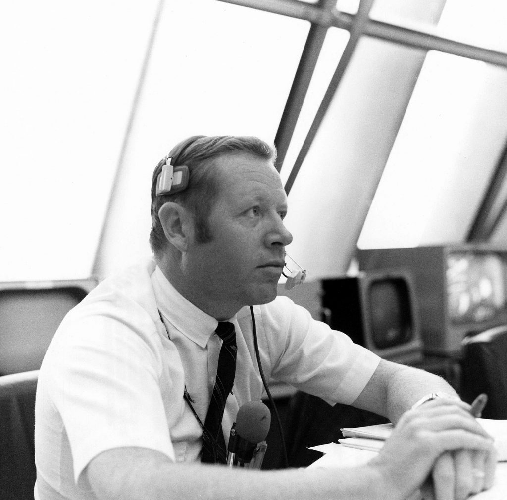 Jack King, KSC Public Affairs Apollo Launch Commentator, follows proceedings of the wet portion of the Countdown Demonstration Test for Apollo 12 from his console within Firing Room 2 of the Launch Control Center. Credit: NASA via Retro Space Images